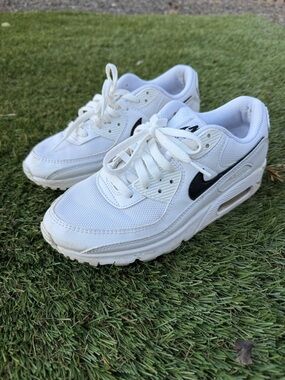 Nike Kids White Sneakers with Black Swoosh Accent
